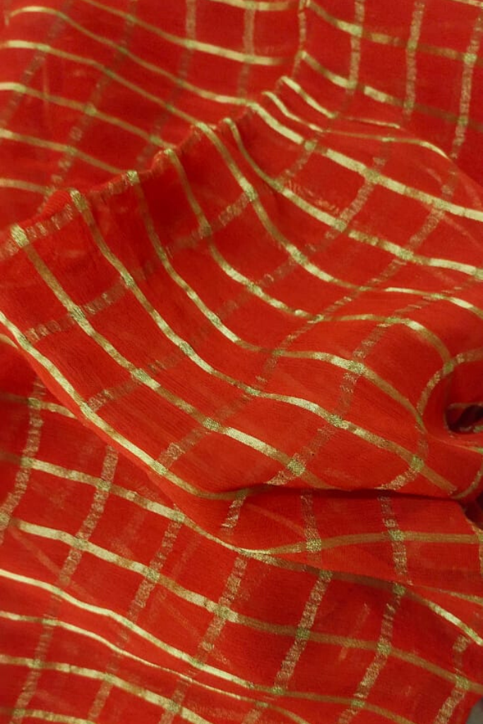 Orangish Red Jari Border Georgette Fabric